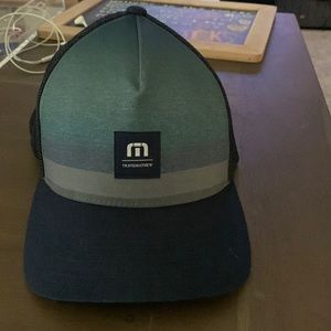 Blue and green Travis Matthew mesh back hat. Not fitted. Like new